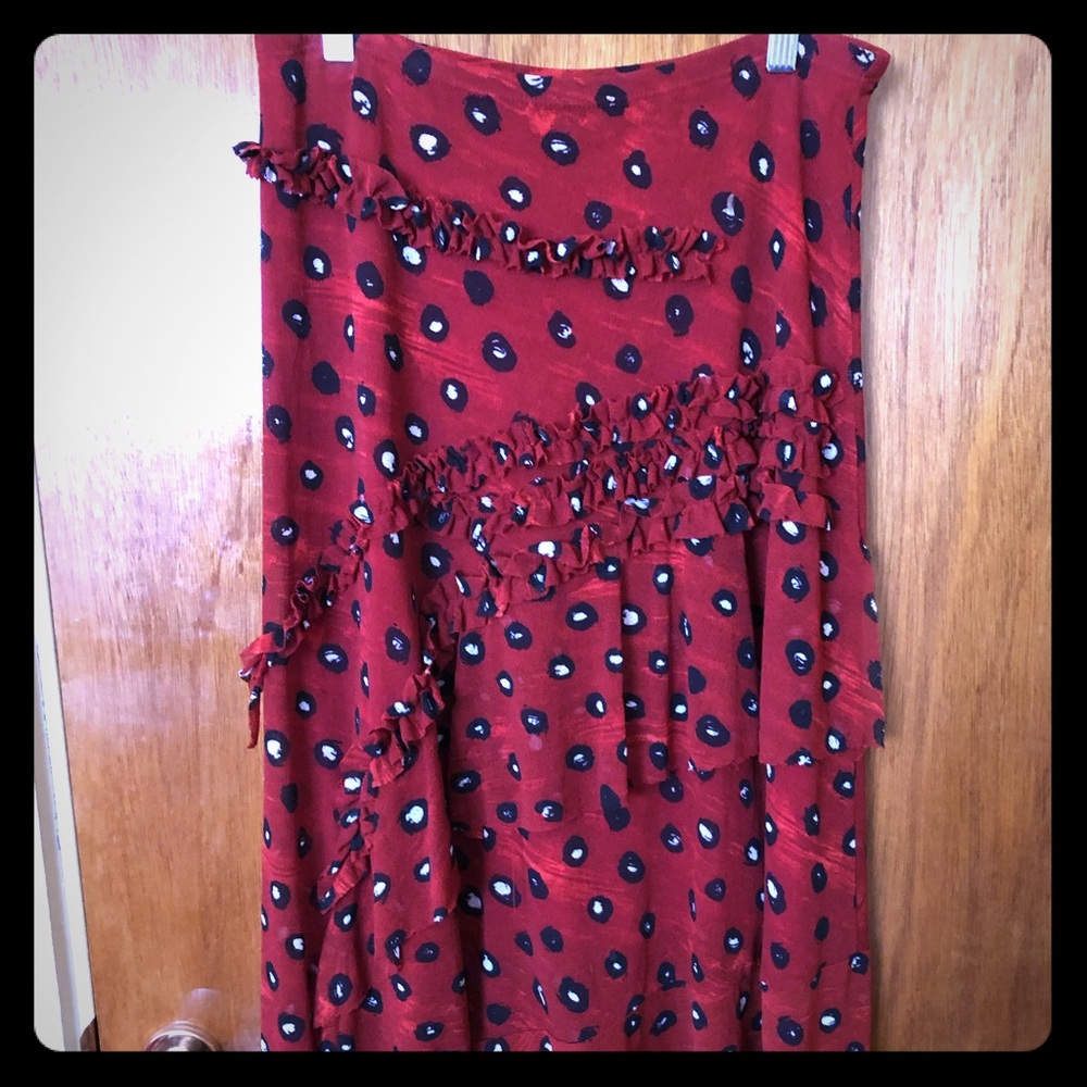 Ruffle detail skirt with fun polka dots.